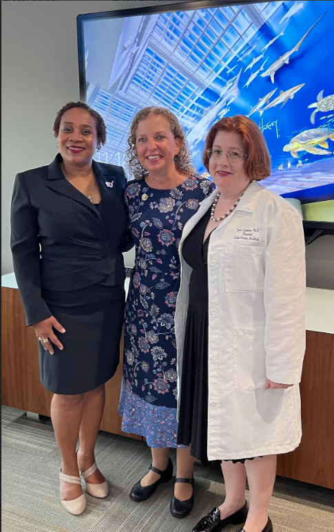 Dr. Michelle Clark, Dean, Barry and Judy Silverman College of Pharmacy, Debbie Wasserman Schultz, U.S. Representative, and Dr. Jean Latimer, Director, AutoNation Institute for Breast Cancer Research and Care. (3rd Image)
